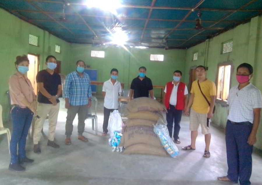 Avantika Associates Pvt Ltd owner, Abhijeet Sahu along with others during the distribution of ration kits in Dimapur on June 1.